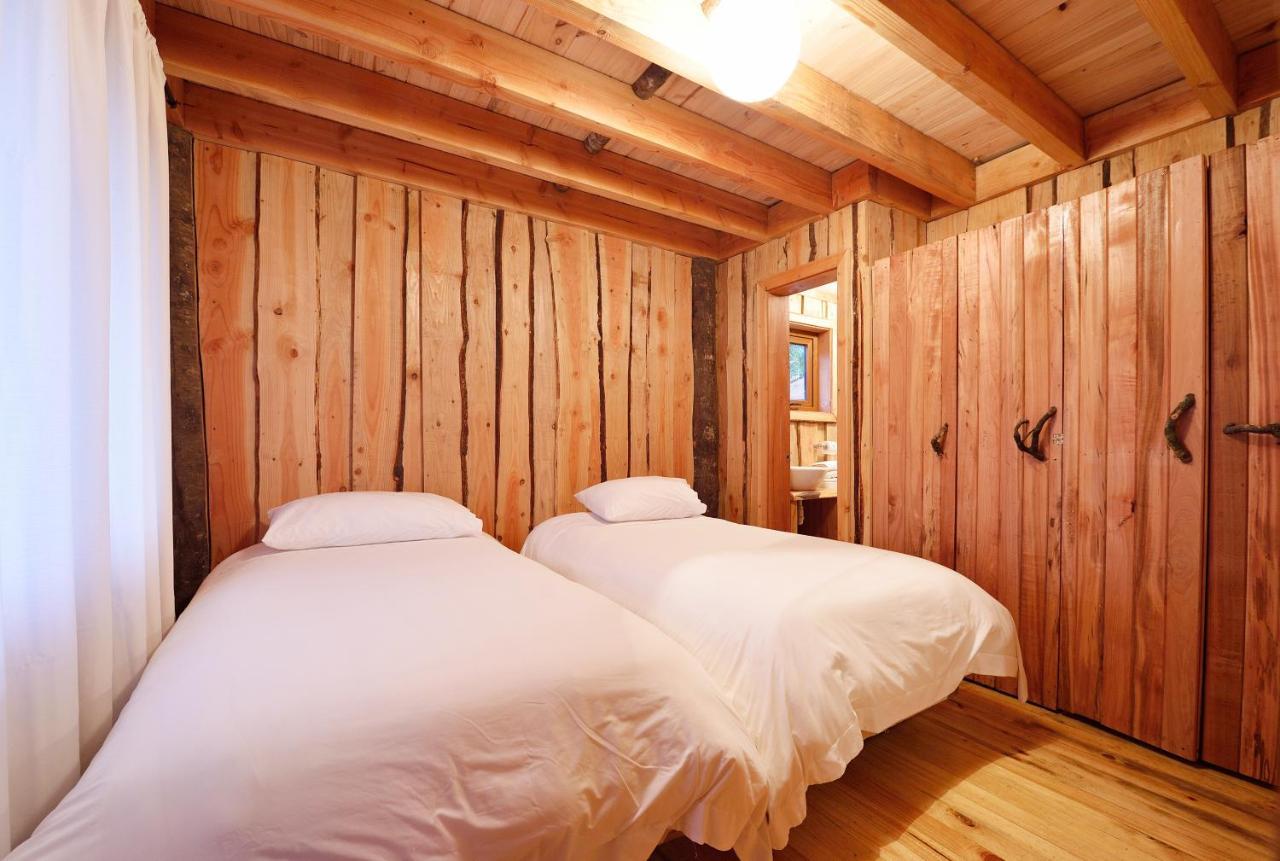 Huilo Huilo Cabañas del Bosque Puerto Fuy Habitación foto